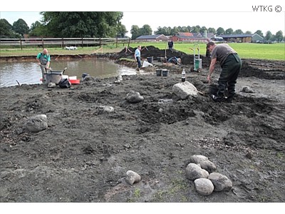 Als alles verspoeld is, resten de typische Miocene keien.